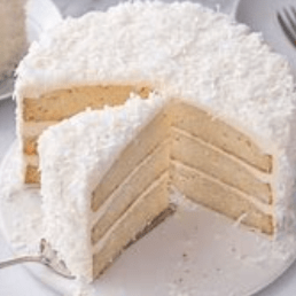 Coconut Cake - A Slice - $6.50 Whole Cake - $55.00